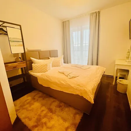 Отель Strandhotel Vier Jahreszeiten